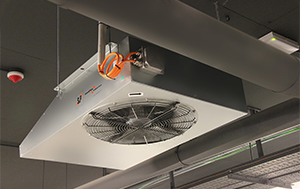 Jet fan at underground parking area. Ventilation fan in the parking lot.  Air flow system. Ventilation system in underground car parking lot at  commercial building. Duct fan air ventilation at mall Stock